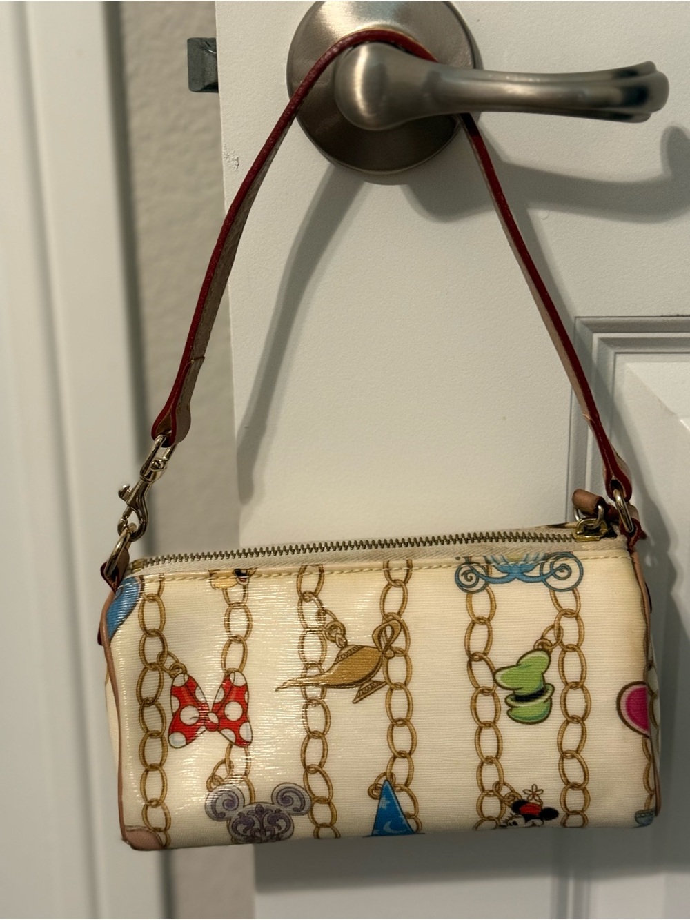 Dooney & Bourke Cream Multicolor Disney Chain-Print Wristlet with Red Strap - Picture 2 of 4
